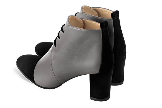 Matt black and ash grey women's ankle boots with laces at the front. Round toe. Medium block heels. Rear view - Florence KOOIJMAN